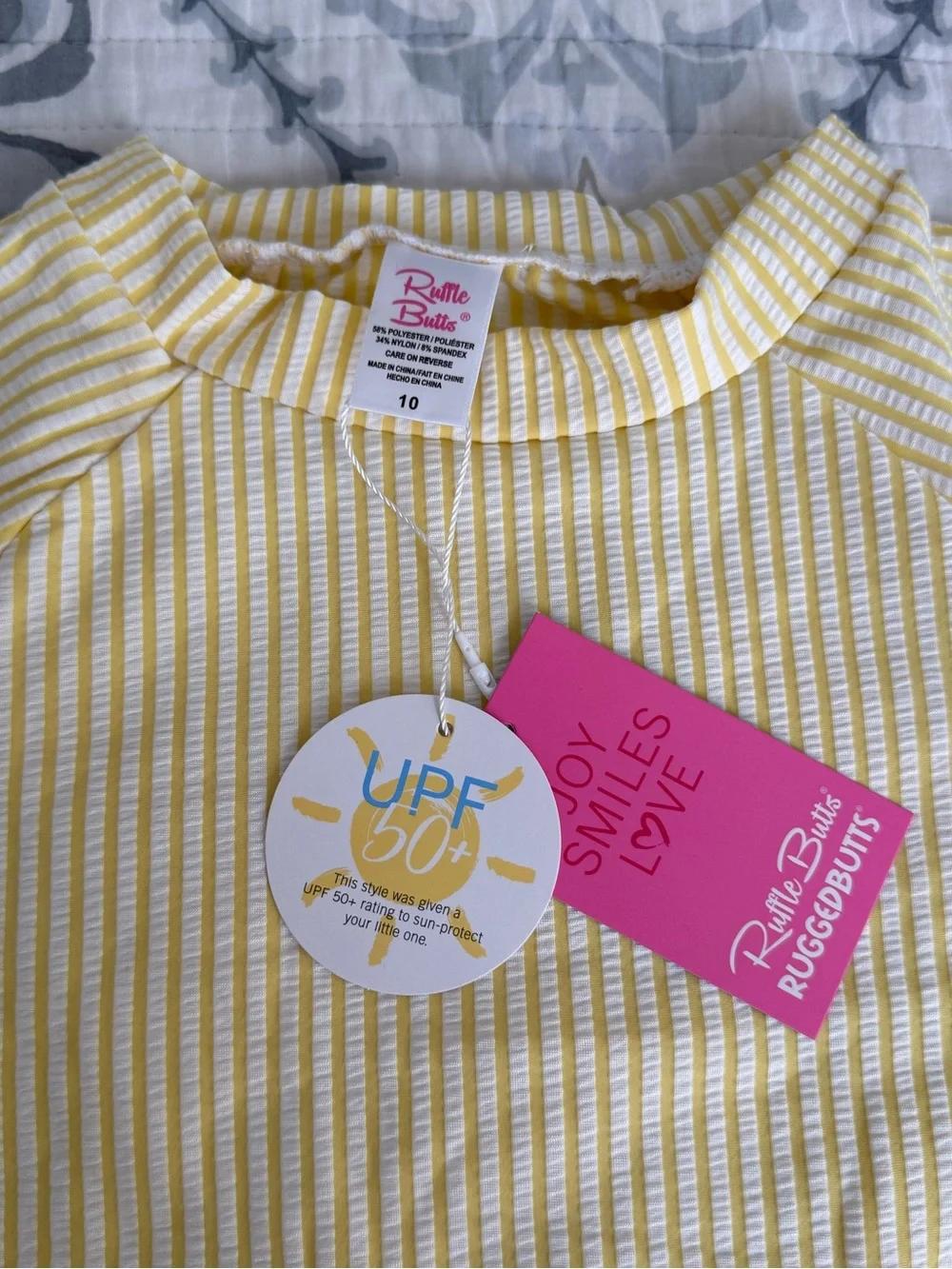 NWT RuffleButts Girls Yellow Striped Ruffle Top UPF 50+ Size 10